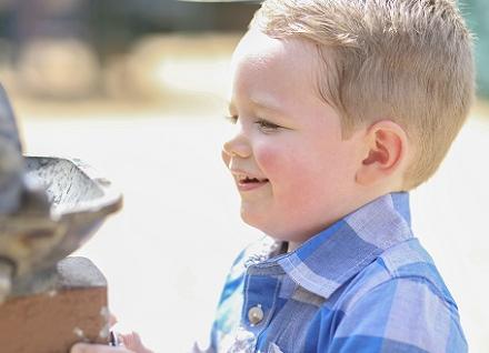 EH-boy-at-fountain